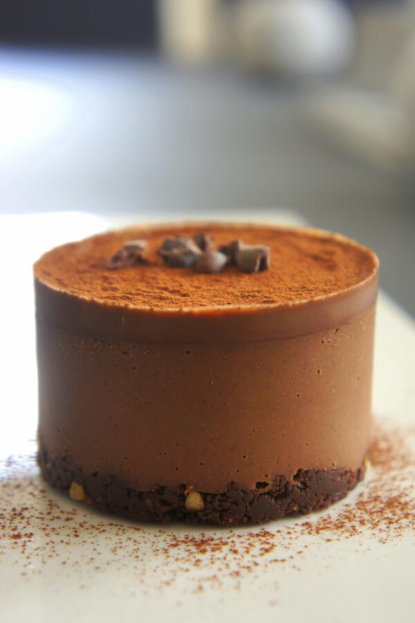 Gourmet chocolate mousse cake with creamy texture, perfect for dessert lovers.